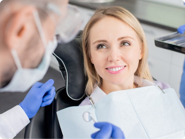 Patient smile after inlays and onlays treatment in Mold