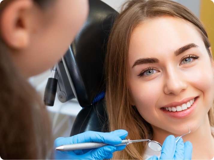 Patient smile after teeth whitening in Mold
